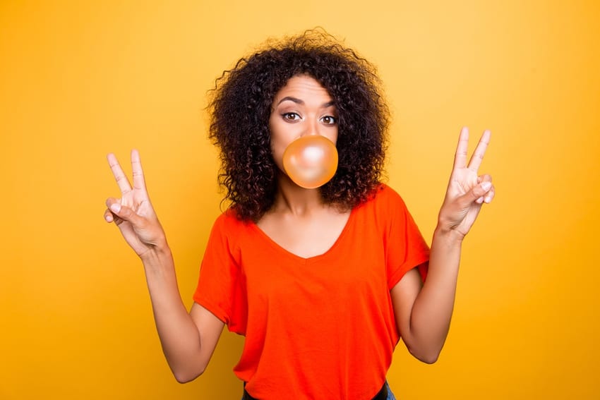 Girl blowing a bubble