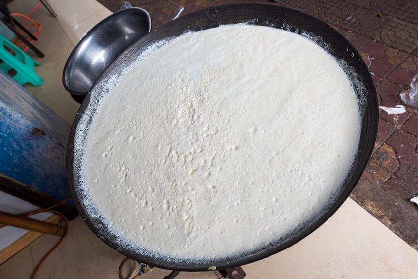 Tofu cooking in a wok