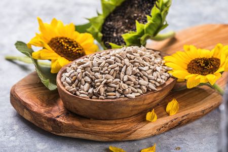 Sunflower seeds with sunflowers