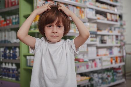 Little boy with head lice