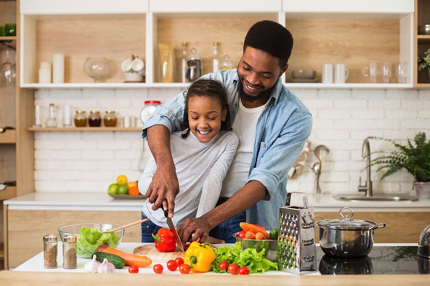 Father & daughter making a vegan meal