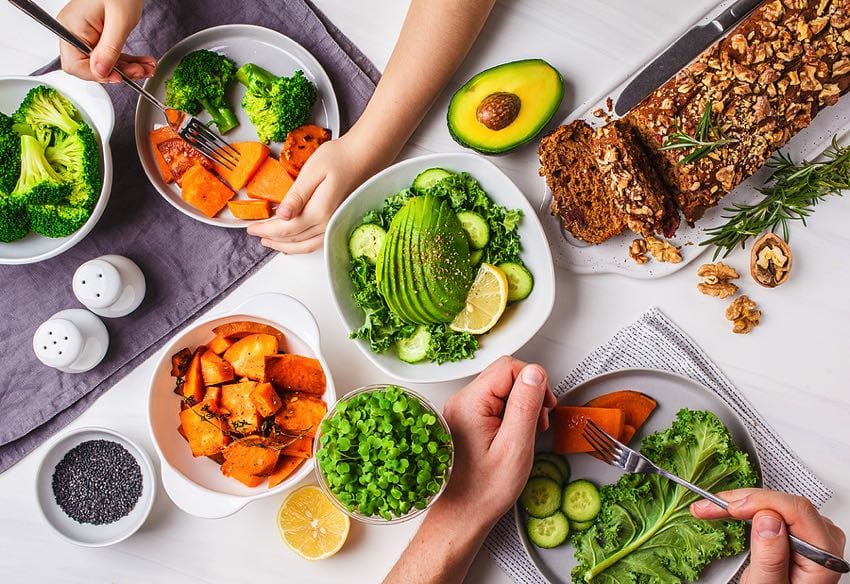 Healthy vegan meal with little hands