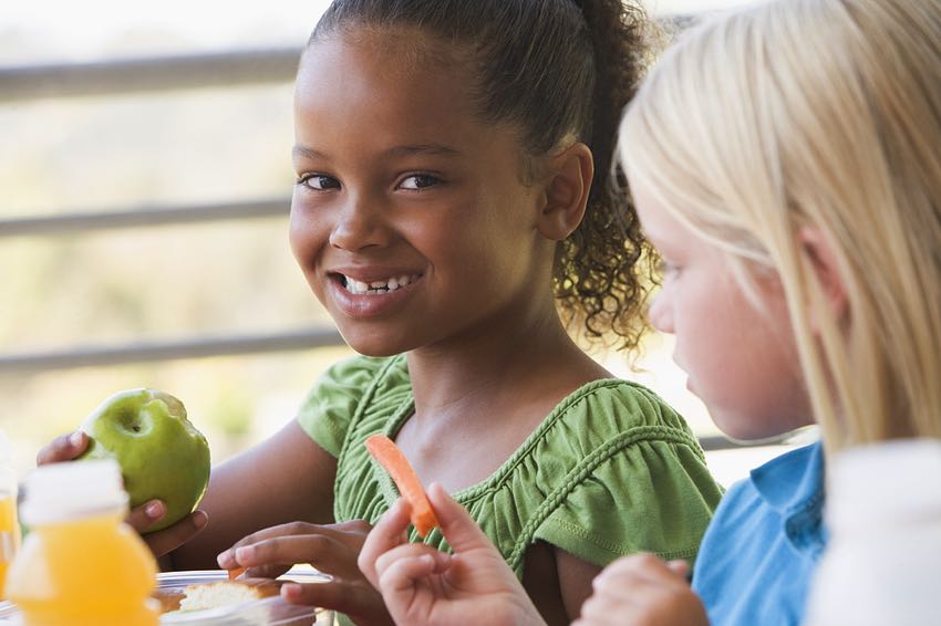 Kids eating vegan lunch at school